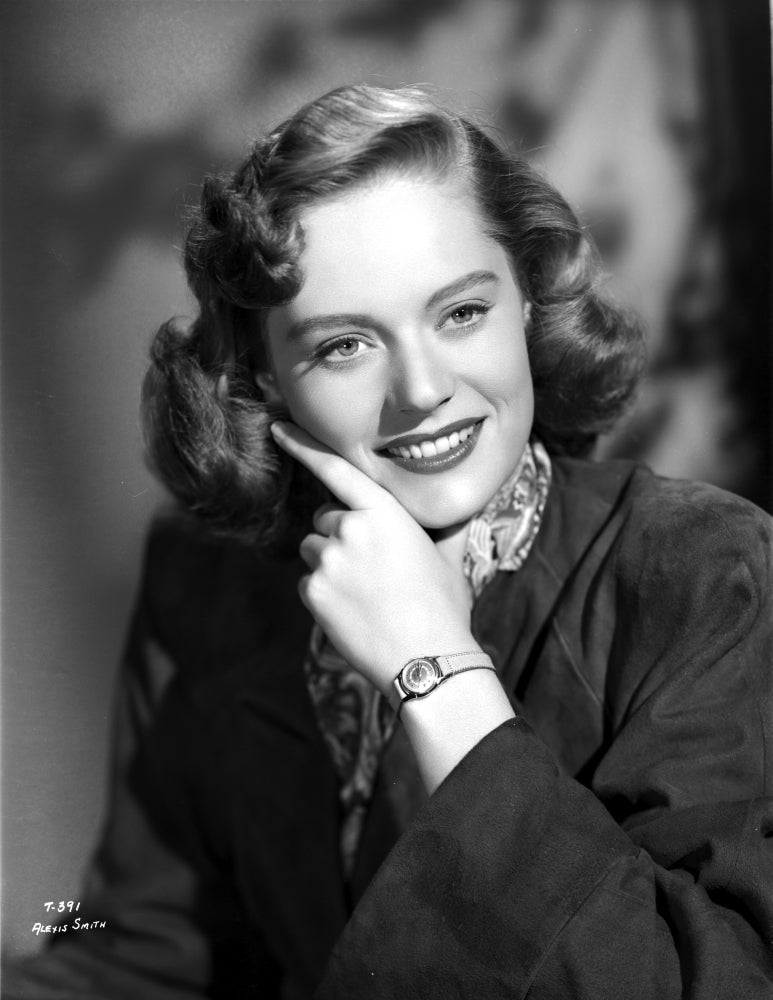 Alexis Smith smiling portrait photo print featuring a wrist watch.