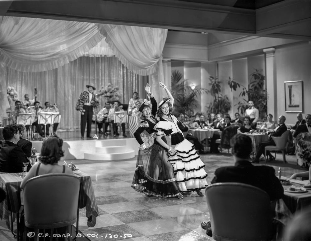 A Scene from Two Latins from Manhattan photo print showcasing classic cinema.