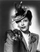Gale Sondergaard posed in hat, vintage photo print