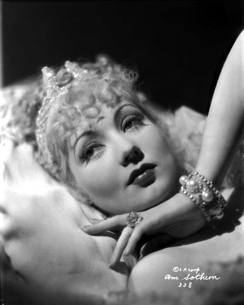 Ann Sothern wearing a beaded bracelet photo print.