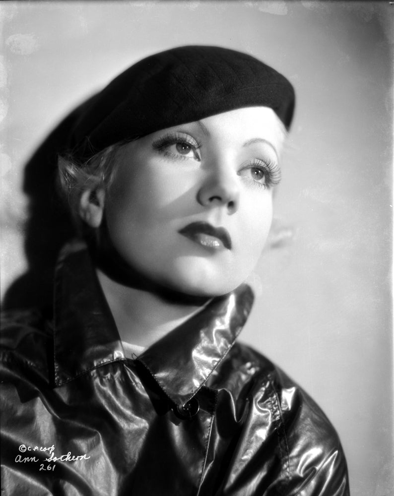 Ann Sothern wearing a glossy jacket photo print