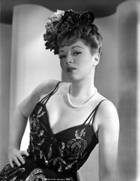 Claire Trevor in black corset with floral hat photo print