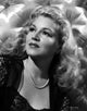Claire Trevor Looking Up in Black Dress with Necklace Photo Print