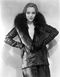Lupe Velez smiling in a black leather jacket with fur collar photo print.