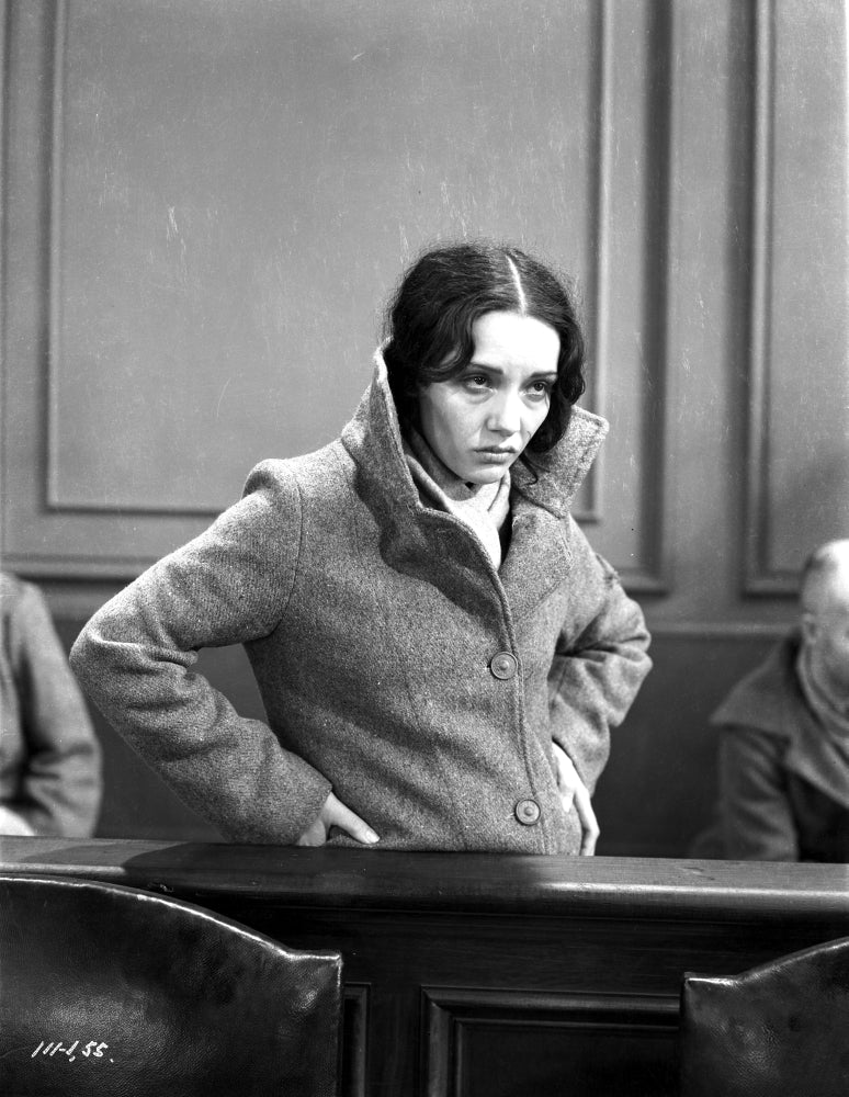 Lupe Velez standing in a sweater with hands on hips photo print.