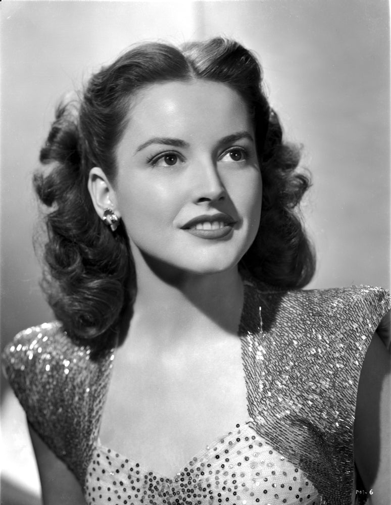 Mary Ware smiling wearing a dotted blouse photo print