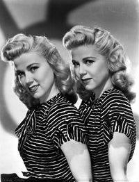 Twins Wilde Portrait Photo Print displayed on wall.