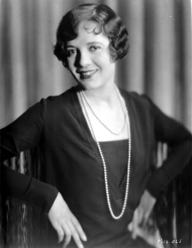 Lois Wilson in a black dress with necklace photo print