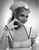 Marie Wilson smiling in a white sailor dress classic portrait photo print