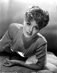 Shelley Winters posed in white V-neck long sleeve shirt photo print.