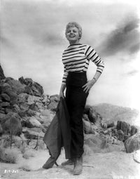 Shelley Winters photo print in white stripe long sleeve shirt and high waist black pants.