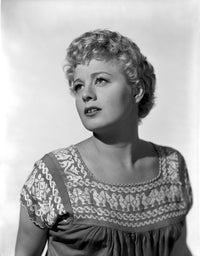 Close up portrait photo print of Shelley Winters in a blouse.