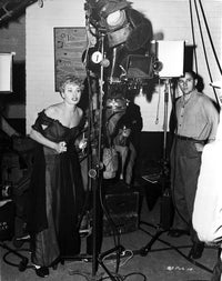 Shelley Winters elegantly posed in a black silk shoulder dress photo print.
