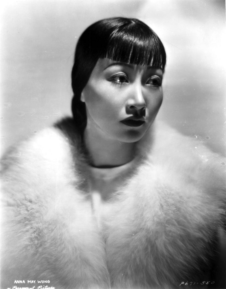 Anna Wong Using a Fur Scarf Photo Print showcasing elegance and vintage style.