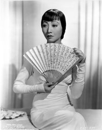 Anna Wong holding a fan photo print in elegant style