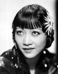 Elegant photo print of Anna Wong wearing a black dress, showcasing classic beauty.