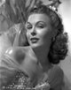 Joan Woodbury vintage photo print with half closed eyes.