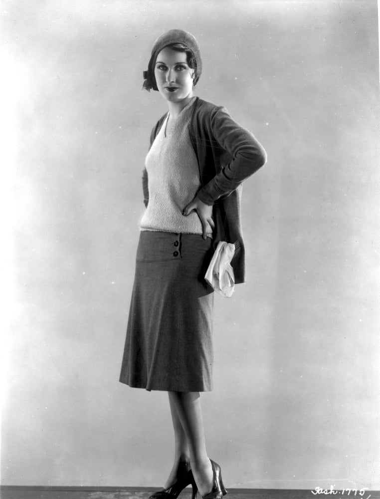 Fay Wray standing in an elegant two-piece dress with black pumps - vintage photo print.