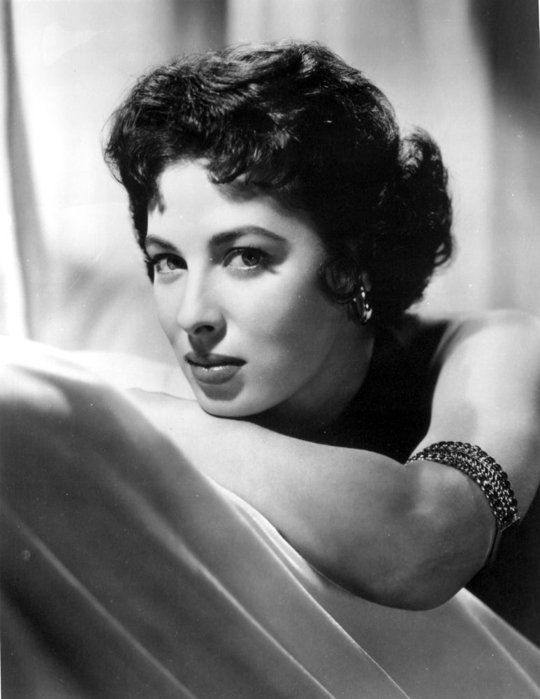 Rita Gam Leaning on Forearm Photo Print showcasing classic cinema elegance.