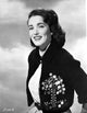 Classic portrait photo print of Julie Adams in a black dress.