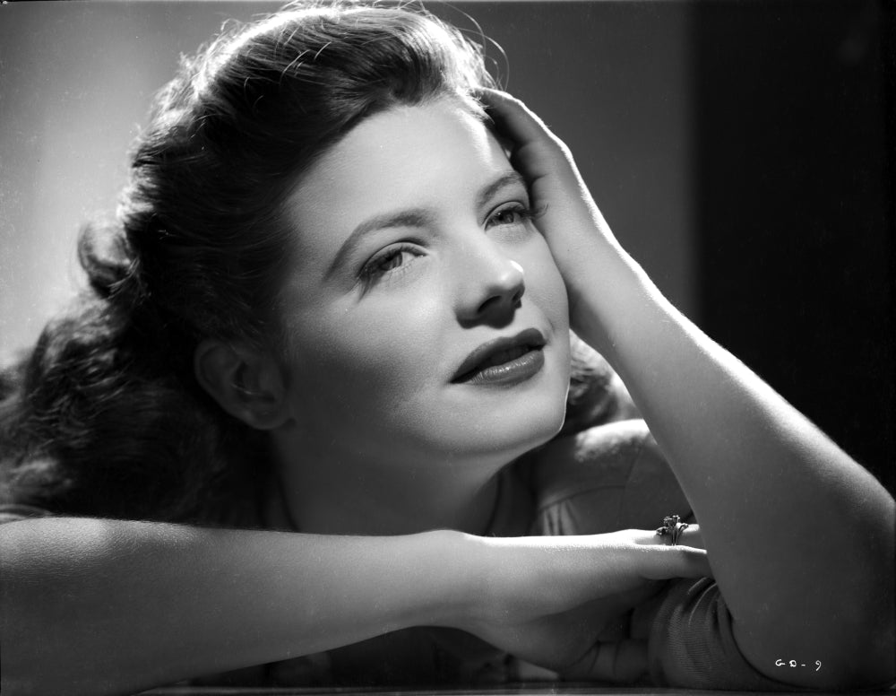 Gail Davis smiling with hand on head photo print