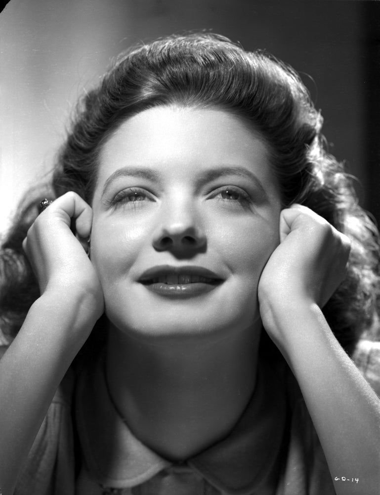 Gail Davis smiling with hands on cheek photo print