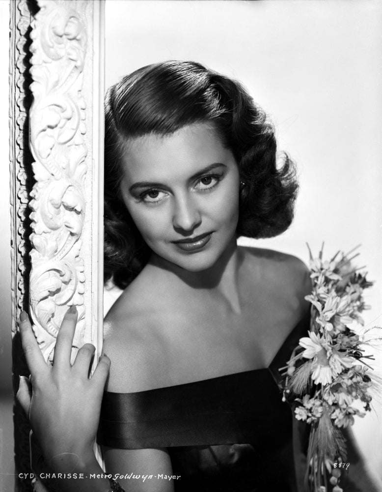 Cyd Charisse photo print holding flower in black blouse