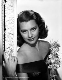 Cyd Charisse photo print holding flower in black blouse