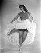 Dinah Shore dancing in a white dress photo print