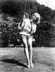 Eva Saint Swinging in Classic Photo Print