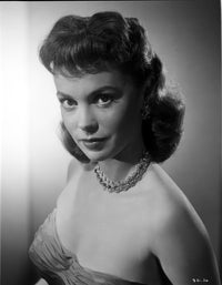 Barbara Darrow in elegant dress with silver necklace photo print.