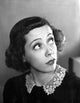 Imogene Coca Looking Up with Embroidered Collar Blouse Photo Print