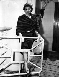 Photo print of Imogene Coca wearing a black dress and hat.