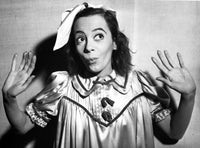 Imogene Coca wearing a silk dress looking up photo print