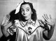 Imogene Coca wearing a silk dress looking up photo print