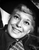 Carol Channing in a printed top and big hat photo print