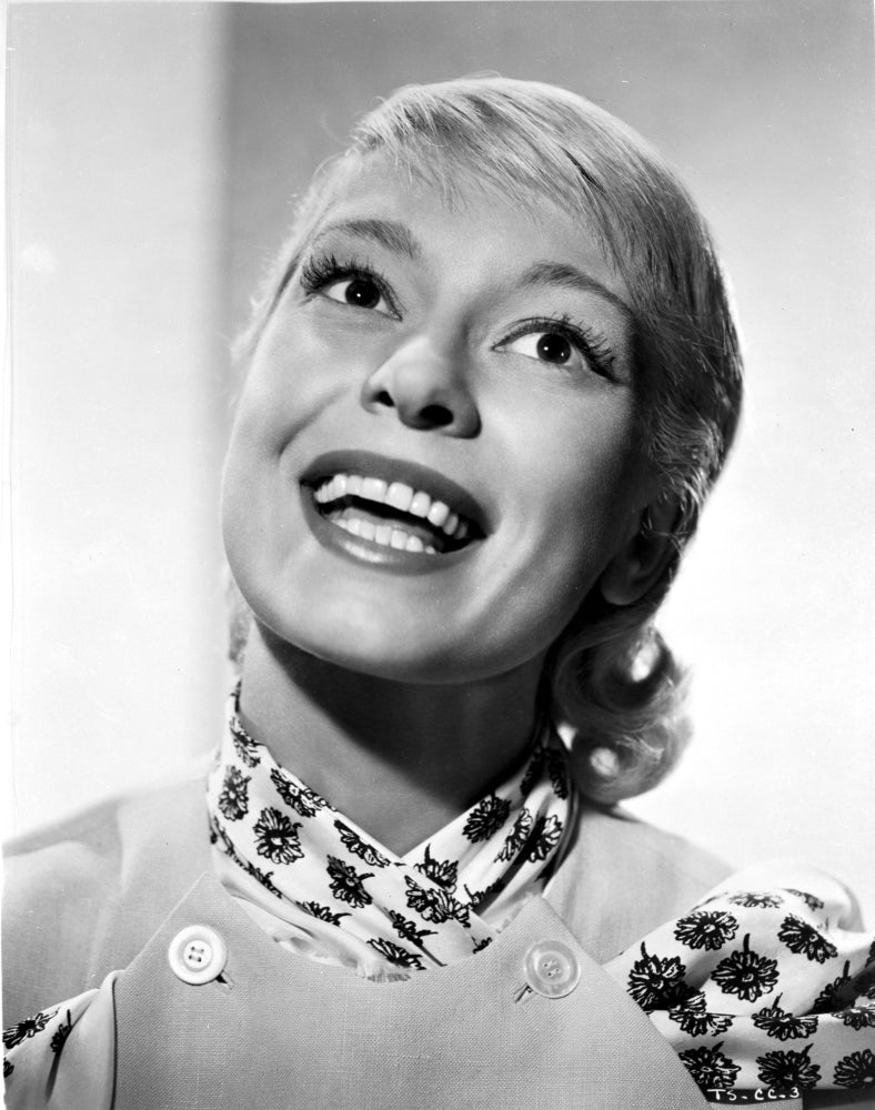 Carol Channing smiling in a printed dress photo print
