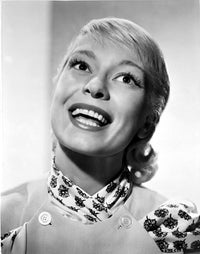 Carol Channing smiling in a printed dress photo print