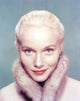 Close-up portrait photo print of Eva Saint, showcasing elegance and charm.