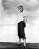 Sandra Dee in white polo side view pose photo print