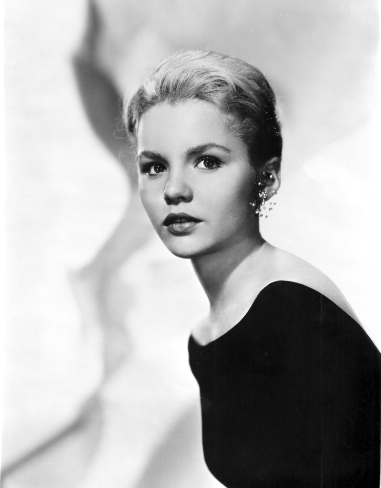 Classic portrait photo print of Tuesday Weld in black top.