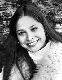 Deborah Raffin smiling in a white sweater photo print.