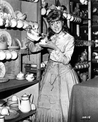 Hayley Mills pouring tea in a cup, elegant photo print