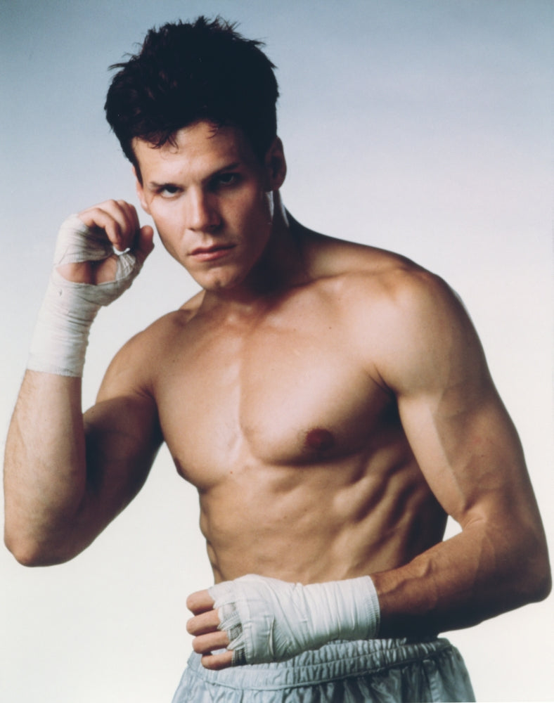 Craig Sheffer Fighting Scene Photo Print showcasing dramatic action.