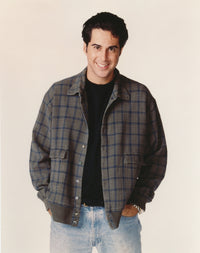 Portrait photo print of Jonathan Silverman in a checkered coat.