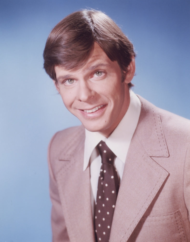 Portrait photo print of Marc Singer in gray coat, available in multiple sizes.