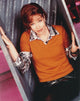 Elizabeth Smith sitting pose portrait photo print in red shirt