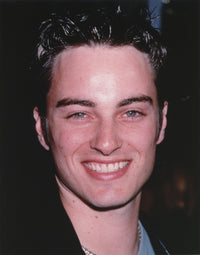 Close-up portrait photo print of Kerr Smith smiling.