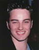 Close-up portrait photo print of Kerr Smith smiling.