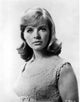 Susannah York wearing a textured blouse - Photo Print